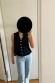 This shirt is cute and nice, a good staple if you need it. I purchased the same one in white, and for some reason, it looked a lot nicer. Especially because I like to tuck in my black shirts, this one didn't look great when tucked in bc it holds its shape. Still think it's a nice shirt. - Julia F.