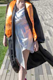 Had been eyeballing this dress for months and finally decided to order it for my college graduation. Have never ordered from Lulus, but I am in love with what I received. Looked exactly like the pictures, although a bit more off-white as others have said. I'm usually a small, sometimes a medium, and went with the medium as others had suggested ordering a size up. It fit perfectly - hugged me at my waist and wasn't too tight on my hips. I do have wider hips so I was a little worried about ordering a nonstretch material online. Overall, it has a very good quality feel and the craftsmanship is excellent. Had to iron on low heat upon receiving, but I mean that's what you expect especially with satin. It's definitely a little short on me to be able to sit down comfortably, but had no issues as I was wearing the robe with it. I got so many compliments wearing this, and I'm very heavily considering ordering another one in sage green once my size is back in stock. - Kate B.