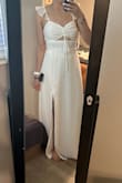 Ordered for my reception and absolutely loved the style, quality material and comfortability. It does not feel cheap. And I can feel myself wearing this on my honeymoon! I'll need a seamstress to fix the straps as they are a little loose. Without shoes, the dress is on the floor. I'll be looking for 2-3" heels vs hemming it. - Jordan M.