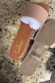 This is my fourth time ordering these slides! I've ordered them in black as well, but the nude are just the perfect color. I ordered a 7.5 and they fit perfectly every time. They are so comfortable and need very little time to break in. In my opinion, they go with everything. Dressed up or down, you can't go wrong. The color and quality are unmatched. I've bought other nude slides and they always lack in one way or another, but not these bad boys. They are truly the greatest nude slides of all time! Don't hesitate to buy, you won't regret it! - Arielle W.