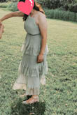 This dress was so flattering, very comfortable, and so much fun to dance in with the moving fabric. I did need to shorten the straps a little; however, it was very easy to do. The strap in the chest is not stretchy, but it did not feel restricting or uncomfortable. - Alyson B.