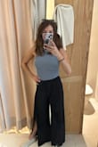 I wasn't sure I was going to feel about these pants when I took them out of the package. The fabric is very light, casual, could be dressed up, but not super dressy. I wore them in Mexico City heat and felt great. The black worked for me, but I could see the colors showing too many wrinkles. Small, true to size. - Meg D.