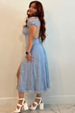 I loved this dress and used it for my graduation ceremony. It's a nice shade of blue and it fits true to size. - Mariel B.