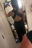 It fits really well! Very easy to move around in. I love the cut of the back! - Erin M.