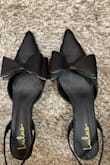 Fit is great! They are beautiful true to size. However the strap in the back makes it feel like they're bigger. The strap is loose made out of elastic so I was able to fix it myself but now the heels look cheaply made. You guys must fix this production issue! Otherwise, they are so cute. - Maria R.