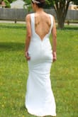 I wore this dress for our intimate (closest family) ceremony and couldn't have asked for anything more! I received so many compliments on the this dress it was incredible. I chose not to get it altered although I probably could've used a small hem and an inch or so taken in at the waist, but i have thicker hips and no waist. I am 5'5 and wore 4-5 inch heels, although I do have a very long torso so I feel like that helped the fit. It made me feel amazingly confident, I was worried I would feel exposed but I didn't feel that way at all! It was elegant and especially at this price point It was perfect. The material was stretchy and comfortable on a 70° May afternoon. - Jillian T.