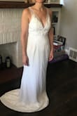 This is my official wedding dress. It is well-made and the material is really nice. The embroidery also looks expensive. I really felt like a bride in this dress and am confident that the it will survive my beach wedding then later a big home reception. (This was out of the box, so hadn't steamed it yet - sorry!) - Amanda K.