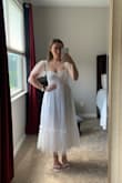 I love this dress so much. It's classy, elegant, and sexy all at the same time. There is some structure to the dress that helps everything feel tucked away and supported. I can't wait to wear this to my welcome dinner for my wedding! - Cami K.