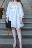 Absolutely loved this dress! I wore it for my college graduation this past weekend and it was perfect. The fabric is light and flowy which was great since it was almost 90 degrees that day. I wore a strapless bra otherwise straps would've shown. The dress came above my knees but still had great coverage. I highly recommend! Will be wearing it for engagement photos when the time comes! - Lily L.