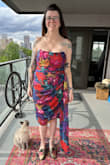 I ordered a bunch of dresses for this upcoming wedding and this is the one I am going with! It fits TTS. The ruching is real flattering. The neckline has a more double point than the photo looks and I find it extra flattering. - Brittany R.