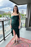 I bought this for an art gallery wedding and really liked it. Originally purchased in the magenta color, but that fabric looked cheaper than I wanted. The green looks sophisticated. It also does not lean holiday, which I was somewhat concerned about. Ultimately a flattering dress. In my case I'd want shapewear to smooth things out, but otherwise great. - Brittany R.