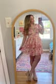 This dress is super cute! I ordered a size small and it fits well, not very stretchy. - Karsyn H.