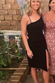 The dress was true to size. I ordered an M, and it fit perfectly. Wore it for a rehearsal dinner, and I was very comfortable all night! Classy & elegant dress! - Katy L.