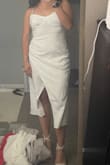 I bought a bunch of dresses in size medium and happened to order this in a large. Most of the dresses I bought fit small, and I usually wear m/l. I'm glad I bought an L instead of an M. The back is super stretchy, the straps are adjustable, and the fabric helps to hug the hips in the right place. I also have a smaller chest, but since the back is stretchy, I think it could work for bigger chests - Alondra S.