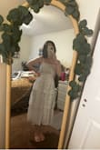 This dress is very flattering. It is a tiny bit see through, but with nude undergarments, you can not tell. I am wearing this for my bridal shower! - Rebecca H.