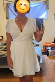 I'm getting married in September, it's going to be a very casual wedding, and this is exactly what I was looking for. It's a true wrap dress (as opposed to a lot of faux wrap dresses I tried on) so I feel like it's great for all body types since it can be tightened or loosened. The large was perfect for me and their size chart was spot on. The sleeves are my favorite part, so cute. The sheer outer layer is adorable but the lining inside keeps it from being see through. Highly recommend! - Quincee P.