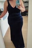 This dress is a dream! It's super soft with a little bit of stretch in the material. The velvet weighs a little bit so it falls beautifully in the mermaid shape. The color is amazing as well, a deep navy. I will be using this as a bridesmaid dress. - Rusmira H.