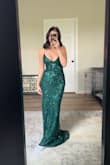 I loveeeee it; the color looks better in person in the website pictures. I was scared it would be kinda blue but it's definitely a gorg dark green. Also, the sizing is really good; you can adjust the whole back to make it nice and tight!! - Ashlee M.