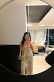 Wore this top for my birthday dinner. It runs a little small, but I wouldn't size up. Super cute top. Can be dressed up or down. - Cynthia H.