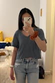 I've been on the search for slightly cropped tops with a looser fit for everyday wear, and this is exactly what I've been looking for! I'm between an XS and an S based on my measurements, and XS fits me perfectly. - Rosalyn T.