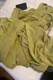 Picture on site shows a light lime green color - I received a medium green moss colored dress. Extremely disappointing as I bought for a wedding in the Caribbean - I wanted something bright and fun! While I understand colors can vary slightly, this is not slightly. I will be returning it. - Jaime V.