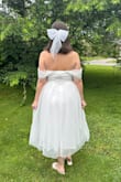 This dress was absolutely perfect. It fit so well and I got so many compliments on it! I styled it with a pearl necklace and a bow to wear it at my shower. Seriously in love with this dress! - Gabby V.