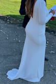 I have to say that this dress is absolutely beautiful. I got a lot of compliments. The material is of good quality. The only thing you have to be aware of is the front. If you are not comfortable enough with your boobs, you need to reconsider getting the dress or find a really good boob-cover adhesive. - Lorelein R.