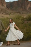 I bought this for engagement pics, and it turned out beautifully! It is super good quality and not see-through at all. - Brenna B.