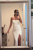 I've searched high a low to find a dress like this for my wedding after trying on something similar but had a $2500 price tag which was out of my budget. Found another one like it for $390 online and it was horrible material. But this is the one! This dress is so comfortable, flattering and exactly what I was looking for. Part of the skirt is a little sheer so it will require some additional alterations but for the price I am blown away by the quality and construction. There is actual boning in the corset top, not just for looks and has enough train that it feels like wedding without it being too much. Can't wait to wear this for my elopement! - Hailey G.