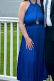 I felt so confident and danced all night in this dress without fear of a boob popping out! I did use fashion tape just to make sure it was symmetrical but loved it! Also was not heavy around the neck like some halters can be. I had to try on a lot of dresses to find one that fit my big boobs but still flatter everywhere else! - Alyssa W.