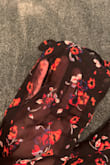 This dress was so cute - looks just like the picture! I'm 5'6, 135lbs, and the Medium was a great fit. Unfortunately, the material is extremely delicate and the sleeve ripped at the seam the second time I wore it :( I am very very sad because it was such a pretty, flirty dress :( - Samantha B.