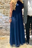 The dress was beautiful, just a little long, but with about 4 inch heels was the perfect length. Only complaint is the strings in the back are very hard to tie, especially if they come undone from the original setup; cannot tighten by yourself.
Love the conservative neckline - Kortni L.