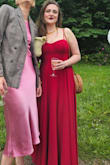 I had the pleasure of wearing this stunning evening gown to a wedding, and I am absolutely impressed with the quality and design. The dress was truly beautiful and fit almost perfectly. The fabric felt luxurious, and the design was exactly what I had hoped for.

The only downside was that the dress was much too long for my height. Fortunately, this was easily fixed with a visit to the tailor to have it shortened. After the alteration, the dress fit like a glove, and I felt completely comfortable in it.

Other than the length, I wouldn't change a thing about this dress. The cut flattered my figure, and the details added an extra touch of elegance. I am super happy with this purchase and would definitely recommend this dress to anyone looking for an elegant and well-fitting evening gown.

Additionally, the color of the dress was slightly darker than it appeared in the photos, but it turned out to be a beautiful bordeaux, which I absolutely loved.

This dress was a fantastic choice for a special occasion, making - Maya G.