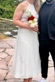 I was looking for a wedding dress that would work for an outdoor May wedding and this was perfect! It was elegant without being too fancy/ frilly for an intimate outdoor ceremony. I ended up using spanx to help me feel more comfortable with how tight the dress is around my stomach. - Brenda T.