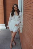i bought this romper last minute for my college graduation pictures. it came so quickly & it turned out to be such a gorgeous piece. so perfect for graduation! my only complaint was that the neck was pretty low cut; i ended up pinning the neck line which worked for the time being. overall i recommend! - Abby S.