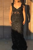 The material was pretty good, was long but that was expected as I'm 4'10, altered it a bit and wore it to prom! - Samantha Z.