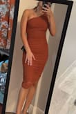 This dress is absolutely stunning! The burnt orange was such a nice color and the ruffles hide any tummy concerns. The quality is great, I definitely recommend buying! - Alexi M.