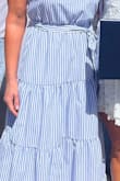 I usually wear a small in Lulus, but I read reviews and went with xs. It fit perfectly. I wore it to my daughter's college graduation. - Rebecca L.