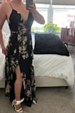 So happy with this dress! The satin material hangs beautifully, the top has the floral print on both sides in case it shows and the bottom half has a soft black liner. It's made in long vertical panels so the print doesn't align but I don't mind it at all. It's also quite flattering in the tummy area as the waist is high and again the way the material flows/hangs adds to that. Putting it with the lulus white bow heels. Love love it! - Alicia A.