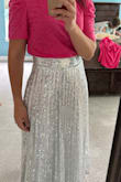 Ordered with overnight shipping, came just in time! I LOVE this skirt, had a good amount of bling and you can dress it up or down. I'm usually a small some times XS but ordered the S. I was nervous it would be a little big but it fit perfectly. - Amanda R.