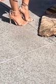 These look like super high heels, but they fit very comfortably and are easy to walk in. Just don't put lotion on your feet beforehand; it was a little slippery for me lol. Love the gold anklet attached. - Alexander W.