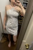 I love this but haven't figured out what to wear it to yet (purchased in 2022, it is now 2024). When I bought this, I was about 10lbs heavier than I am in this photo. It fit me quite well when I bought it but is now loose in the back where the zipper is. If you're looking at my current measurements, I'd go for an XS. My only other issue with it is that the lace part at the top point flaps down as soon as I move, so I will probably have to stitch it in better place. - Hannah A.