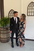 Love this dress so much! The shape is very flattering! You will need to wear an elevated shoe if you're 5'5" or shorter because the back of the skirt is a little long. Get it! - Valerie S.