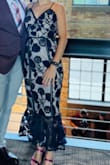 This is a beautiful dress! Wore it as a guest to a wedding. My only problem is that the chest was a bit baggy but was easily fixed by using safety pins on the side of dress (under armpits). The design is beautiful and easy to slip on and off. - Emily O.