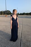 My daughter wore this dress as a sophomore going to senior prom to take photos for photography. It is a very elegant and understated dress. She is a size 2 and the xs fit her perfectly. Like it was made for her. - Danielle A.