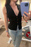 This shirt is stunning. There is a bit of stretch to the fabric. I'm so so happy I decided to size up from xs to small. The small is just on the cusp of being too small. I'm an athletic 118lbs. I would follow the size guide because it was spot on for me! Definitely some cleavage to be aware of - Paige M.