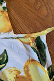 The dress still will not cover the breast area. Why? Because the material is cut short of the seam.  Cheap poorly made.  I will not buy clothes from you again. - Whitney P.
