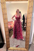 I felt like a princess in the dress. The waist was a big snug for me, so I sized up. Once I did that, it fit perfect! Very beautiful and flowy. The low cut made my boobs look great. It was easy to adjust in the back and make sure it didn't pill out around the sides of the top of the dress. It was super easy to get on and off as well. Not too heavy and very breezy. - Ally G.
