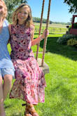 Super cute, long dress. On a shortie like me, it's a maxi dress! A little loose at the sleeves for a small bust. The bust is a super cute floral, perfect for spring. - Emily M.