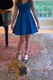 A gorgeous dress. The pockets were spacious without being too noticeable. I was able to wear it without a bra and it was fine- the adjustable straps were a huge plus. not too short or long on me which was awesome. It's a bit darker than in the photos, but it's still a lovely shade of blue. - Suzanne W.